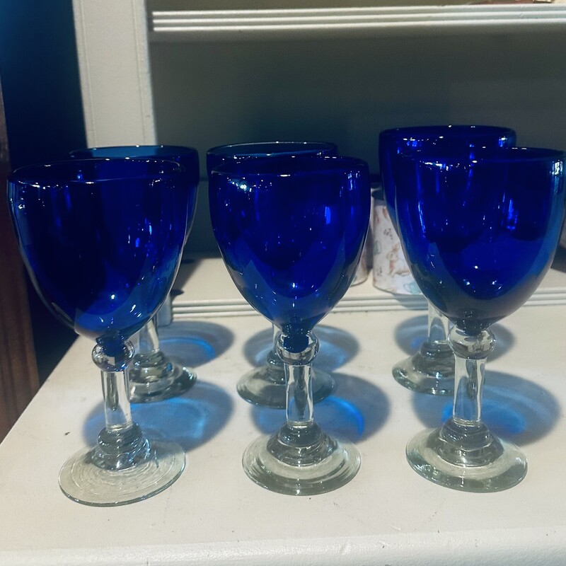 6 Cobalt Blue Goblet,
 Size: 3.5x7.5
Beautiful handblown set of heavy cobalt
blue goblets with clear stem and base.
All in perfect condition.