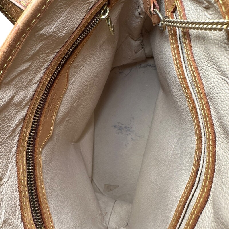 Louis Vuitton Petite  Bucket Monogram Bag with Pouch

Date Code: VI0071

Dimensions: 10H X 9L inches

In good condition. Some wear and peeling inside the interior. Some water marks on the bottom leather.

Does not come with original dust bag or box