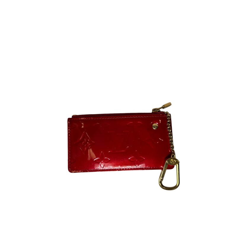 Louis Vuitton Vernis Red  Key Holder<br />
<br />
Date Code: CA1016<br />
<br />
Dimensions: 5 L X 3 H inches<br />
<br />
In very good condition. Some minor scuffs on the patent leather.<br />
<br />
Does not come with original dust bag or box.