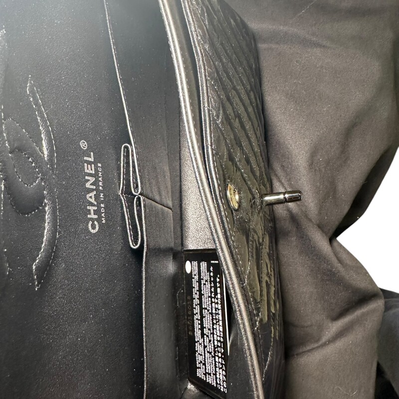 Chanel So Black Classic Double Flap Bag Chevron Crinkled Patent Medium<br />
<br />
Date Code: 26******<br />
<br />
Dimensions:<br />
10W x 6.5H x 2.5D<br />
9 handle drop<br />
16 strap drop<br />
<br />
In excellent condition. Light scuffs to the interior.<br />
<br />
Comes with the original dust bag and card. No box.