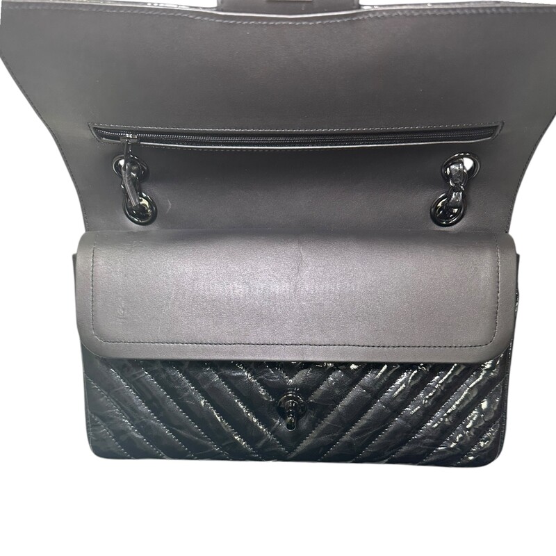 Chanel So Black Classic Double Flap Bag Chevron Crinkled Patent Medium

Date Code: 26******

Dimensions:
10W x 6.5H x 2.5D
9 handle drop
16 strap drop

In excellent condition. Light scuffs to the interior.

Comes with the original dust bag and card. No box.