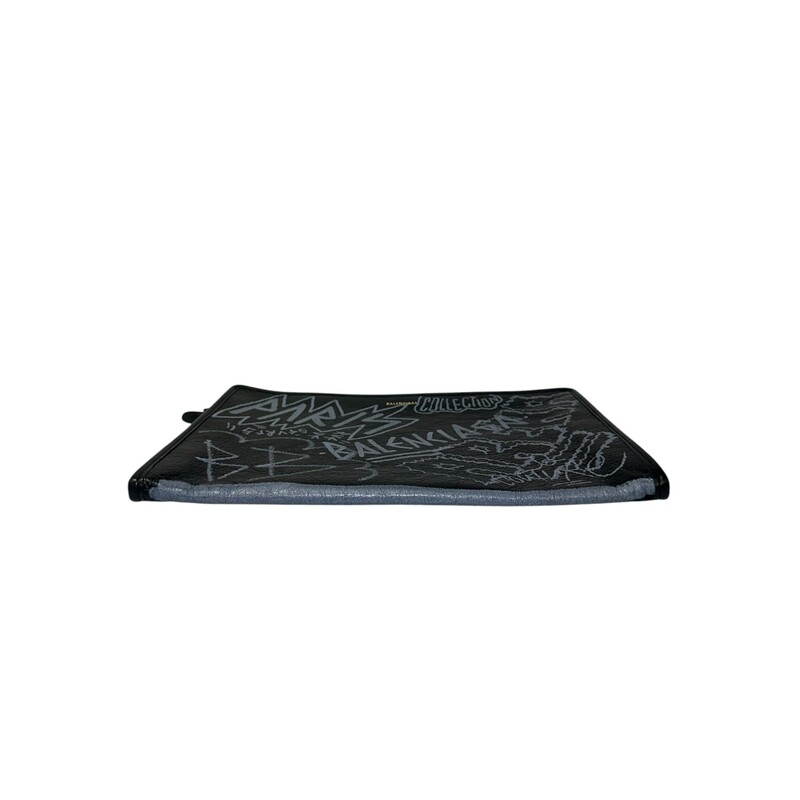 Balenciaga Graffiti Leather Clutch Pouch<br />
<br />
Style code: 443658.1090. Y.535269<br />
<br />
Dimensions: 13 L x 9 H<br />
<br />
In very good condition. Some interior marks and some slight distressing of the leather.<br />
<br />
 Does not come with original dust bag or box.