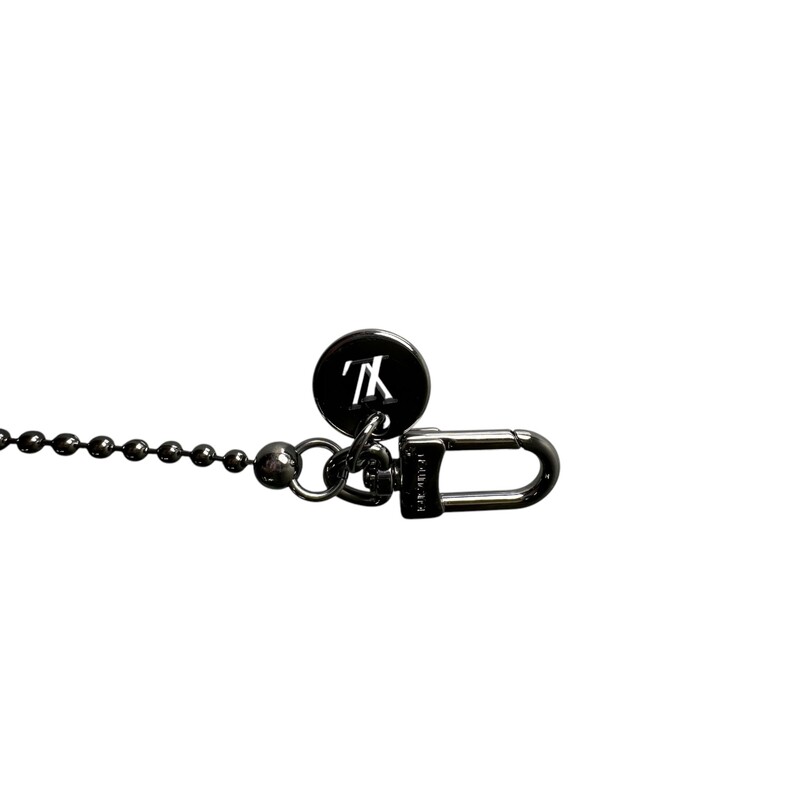 Louis Vuitton  Eclipse Chain Charm Key<br />
<br />
Style Code: M 63629<br />
<br />
In very good condition. Some scratching of the  hardware.<br />
<br />
Does come with original dust bag and box.