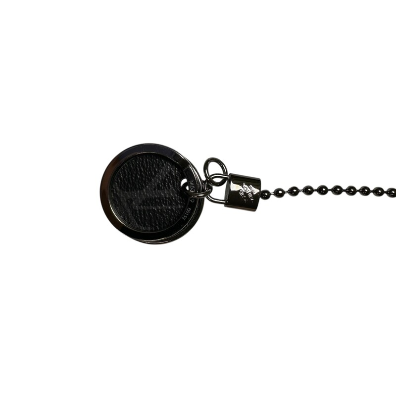 Louis Vuitton  Eclipse Chain Charm Key<br />
<br />
Style Code: M 63629<br />
<br />
In very good condition. Some scratching of the  hardware.<br />
<br />
Does come with original dust bag and box.