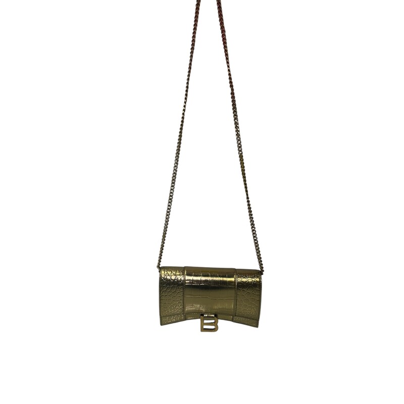 Balenciaga Hourglass WOC Metallic Gold<br />
<br />
Code: 656050.8005.Q.535<br />
<br />
Dimensions:<br />
7.5W x 4.5H x 2D<br />
None handle drop<br />
21.5 strap drop<br />
<br />
In very good condition. Light scuffing to the hardware and leather.<br />
<br />
Does not come with the original dust bag or box.