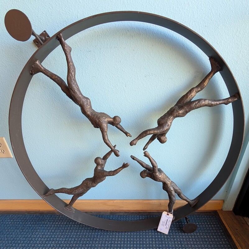 Reaching For Center Iron Sculpture
40in Round