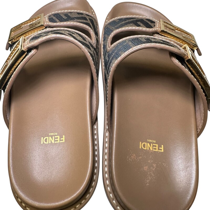 Fendi Jacquard Dual Buckle Sandals<br />
<br />
Size: 38<br />
<br />
In very good condition. Light scuff on the interior sole.<br />
<br />
Comes with the original dust bag and box.