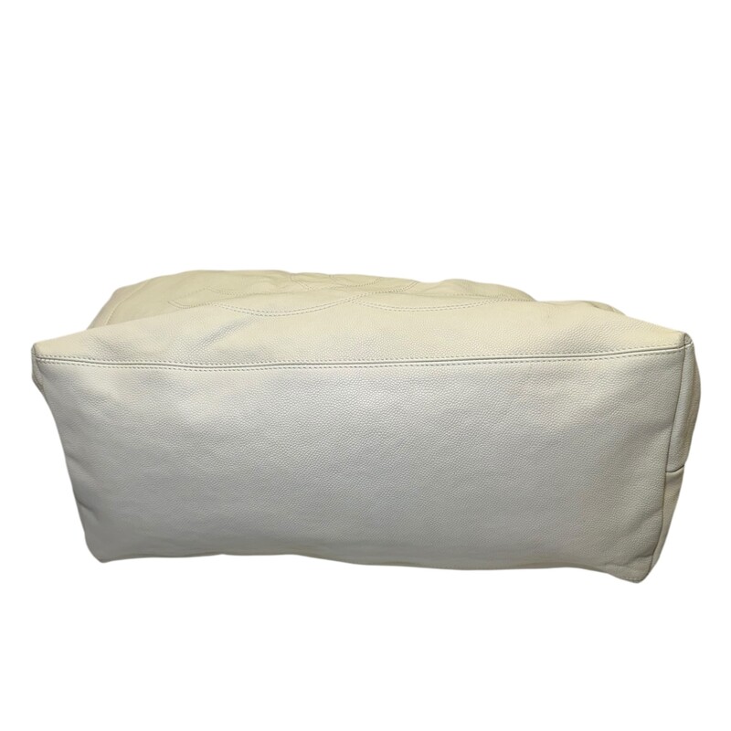 Chanel Coco Cabas Tote White XLarge<br />
<br />
Code: 10895038<br />
<br />
Dimensions:<br />
Length: 23.00 in<br />
Width: 7.50 in<br />
Height: 11.00 in<br />
Drop: 7.00 in<br />
<br />
In very good condition. Slight discoloration throughout the bag. Light interior stains.<br />
<br />
Does not come with the original dust bag or box.