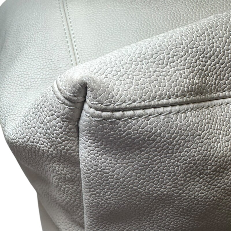 Chanel Coco Cabas Tote White XLarge<br />
<br />
Code: 10895038<br />
<br />
Dimensions:<br />
Length: 23.00 in<br />
Width: 7.50 in<br />
Height: 11.00 in<br />
Drop: 7.00 in<br />
<br />
In very good condition. Slight discoloration throughout the bag. Light interior stains.<br />
<br />
Does not come with the original dust bag or box.