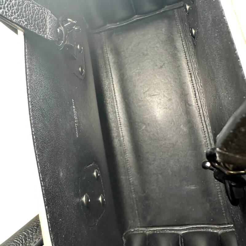Saint Laurent  Sac De Jour Black & White Trim  Calfskin Tote<br />
<br />
Serial Code: GNR378299.0916<br />
<br />
Dimensions: 12 L X 10 H inches<br />
<br />
In very good condition. Some minor corner wear and some interior marks.<br />
<br />
Does not come with original dust bag or box..