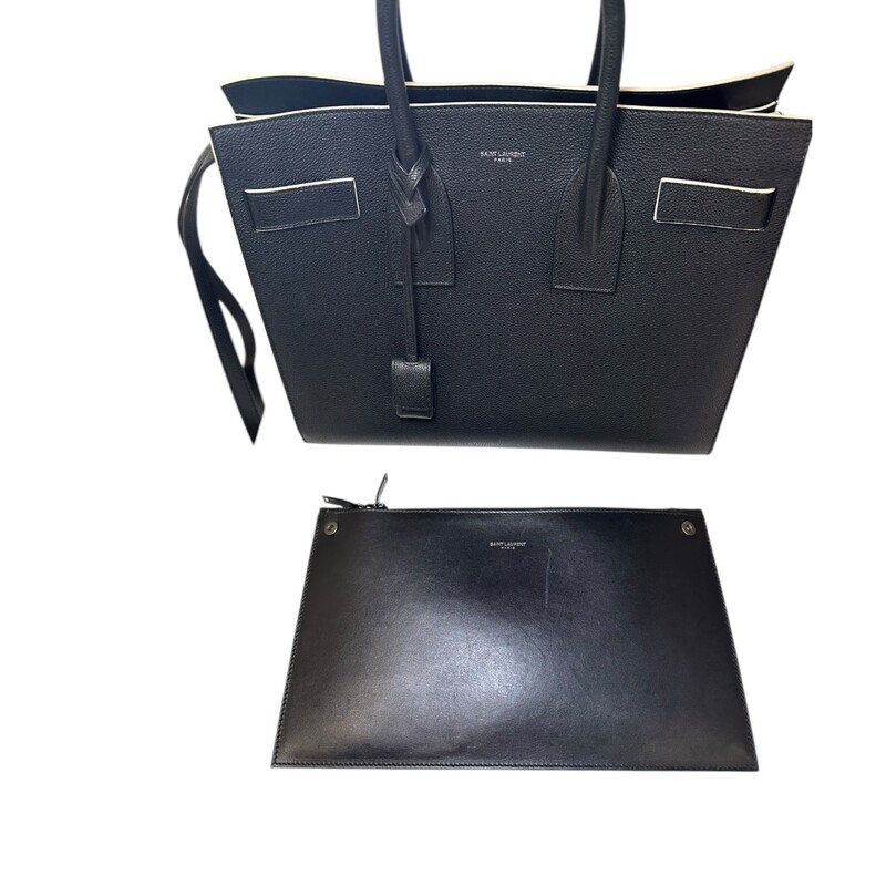 Saint Laurent  Sac De Jour Black & White Trim  Calfskin Tote<br />
<br />
Serial Code: GNR378299.0916<br />
<br />
Dimensions: 12 L X 10 H inches<br />
<br />
In very good condition. Some minor corner wear and some interior marks.<br />
<br />
Does not come with original dust bag or box..