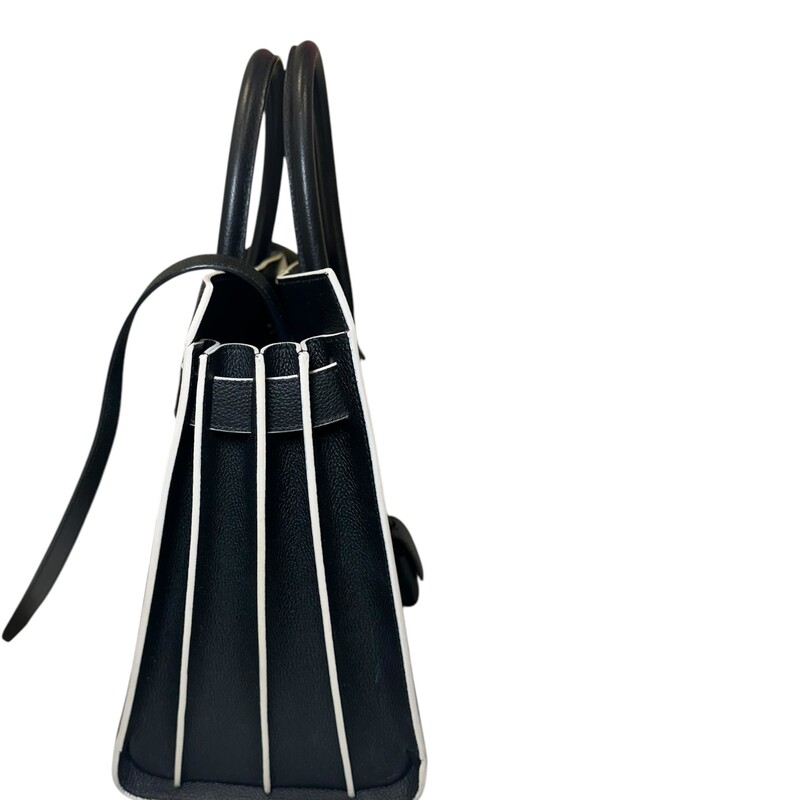 Saint Laurent  Sac De Jour Black & White Trim  Calfskin Tote

Serial Code: GNR378299.0916

Dimensions: 12 L X 10 H inches

In very good condition. Some minor corner wear and some interior marks.

Does not come with original dust bag or box..