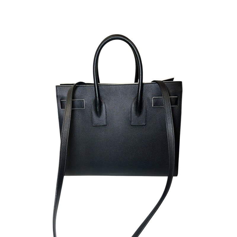 Saint Laurent  Sac De Jour Black & White Trim  Calfskin Tote<br />
<br />
Serial Code: GNR378299.0916<br />
<br />
Dimensions: 12 L X 10 H inches<br />
<br />
In very good condition. Some minor corner wear and some interior marks.<br />
<br />
Does not come with original dust bag or box..