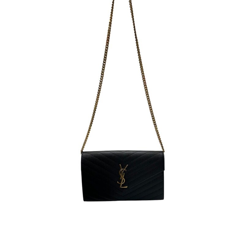 Saint Laurent  Cassandre Grained Wallet On A Chain<br />
<br />
Serial Code: NOV377828.1022<br />
<br />
Dimensions: 5.5H x 9W x 1.5D<br />
<br />
In very good condition. Light hardware scratches.<br />
<br />
Comes with the original dust bag and box.