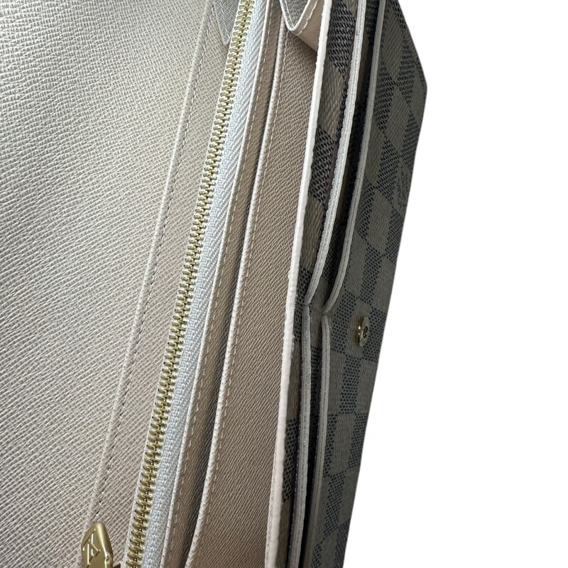 Louis Vuitton Sarah Damier Azur Wallet<br />
<br />
Date Code: Microchip<br />
<br />
Dimensions:7.5 x 4.1 x 0.8 inches<br />
                        (Length x Height x Width<br />
<br />
In very good condition. Some minor hardware scratches.<br />
<br />
Comes with origianl dust bag. No box.