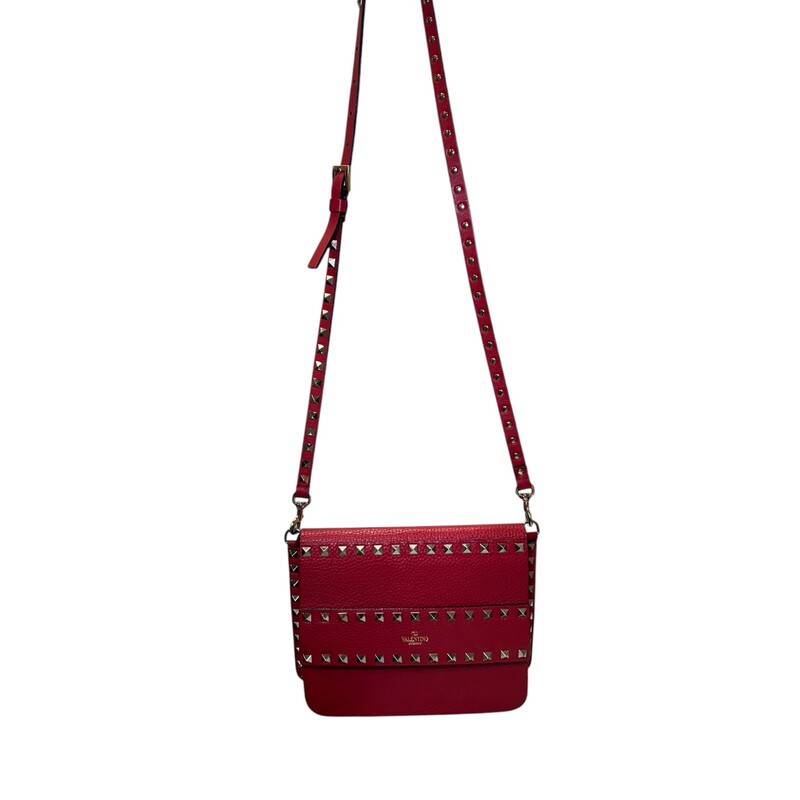 Valentino Slide Slip Pebbled Rockstud Crossbody<br />
<br />
Dimensions:<br />
9inx6.5inx2.5in<br />
Strap Drop: 17.25in<br />
<br />
In very good condition.<br />
<br />
Comes with the original dust bag. No box.