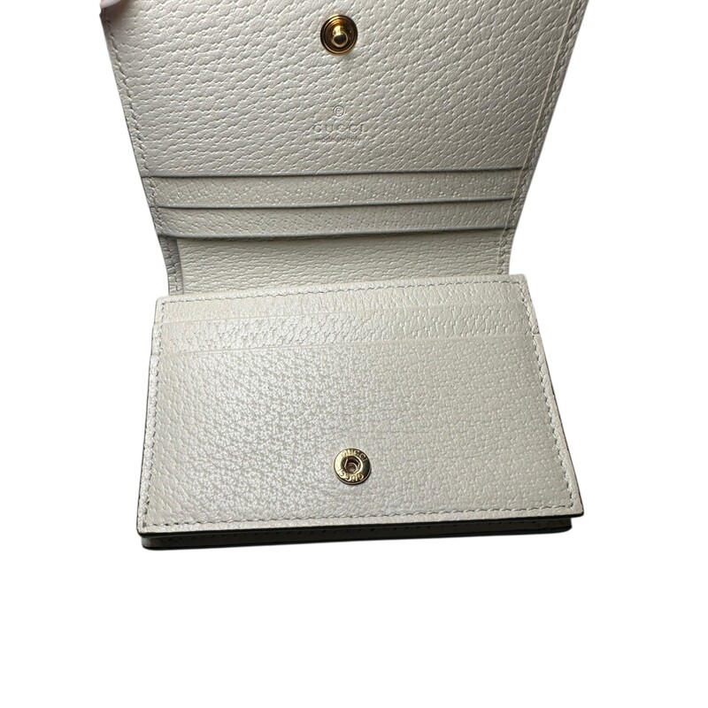 Gucci Marmont Marmont Berry Wallet<br />
<br />
Style Code: 45612.203887<br />
<br />
Dimensions: 4 L X 3 H inches<br />
<br />
In excellent condition. Very faint sctraches on hardware.<br />
<br />
Does not come with original dust bag or box.