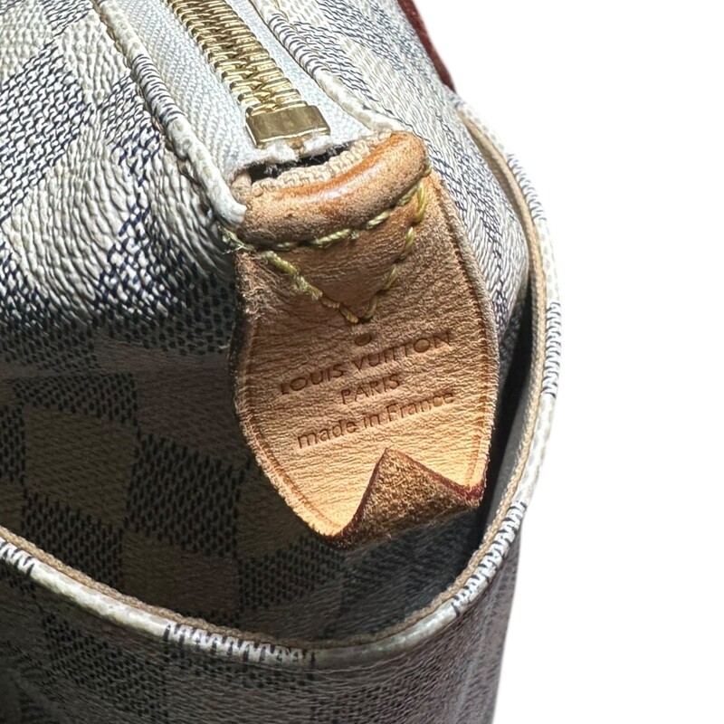 Louis Vuitton Totally PM Damier Azur<br />
<br />
Date Code: FL2190<br />
<br />
Dimensions:<br />
Base length: 11 in<br />
Height: 10.5 in<br />
Width: 5 in<br />
Drop: 8.5 in<br />
<br />
In very good condition. Light corner wear. Stains to the interior.<br />
<br />
Does not come with the original dust bag or box.