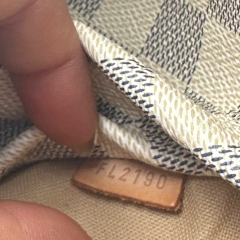 Louis Vuitton Totally PM Damier Azur<br />
<br />
Date Code: FL2190<br />
<br />
Dimensions:<br />
Base length: 11 in<br />
Height: 10.5 in<br />
Width: 5 in<br />
Drop: 8.5 in<br />
<br />
In very good condition. Light corner wear. Stains to the interior.<br />
<br />
Does not come with the original dust bag or box.