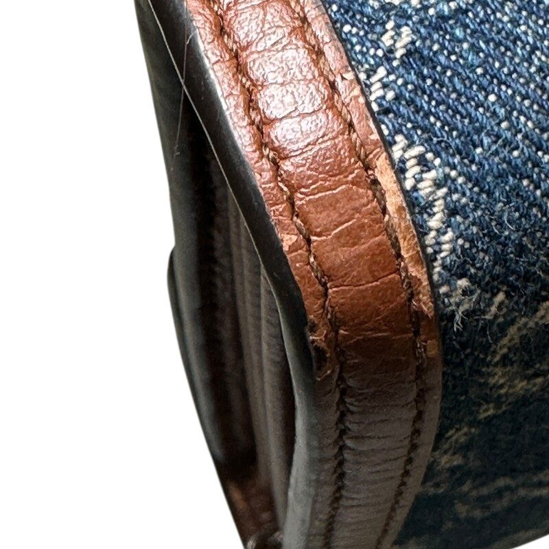 Gucci Denim Dionysus Mini WOC<br />
<br />
Style Number: 401231.2184<br />
<br />
Dimensions: 8 L x 6 H inches<br />
<br />
In very good condition. Some wear on the leather trim and some interior marks.<br />
<br />
Does not come with original dust bag or box.