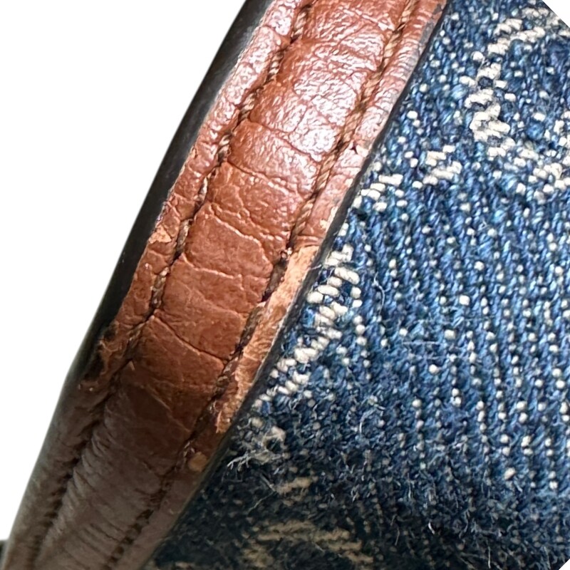 Gucci Denim Dionysus Mini WOC<br />
<br />
Style Number: 401231.2184<br />
<br />
Dimensions: 8 L x 6 H inches<br />
<br />
In very good condition. Some wear on the leather trim and some interior marks.<br />
<br />
Does not come with original dust bag or box.