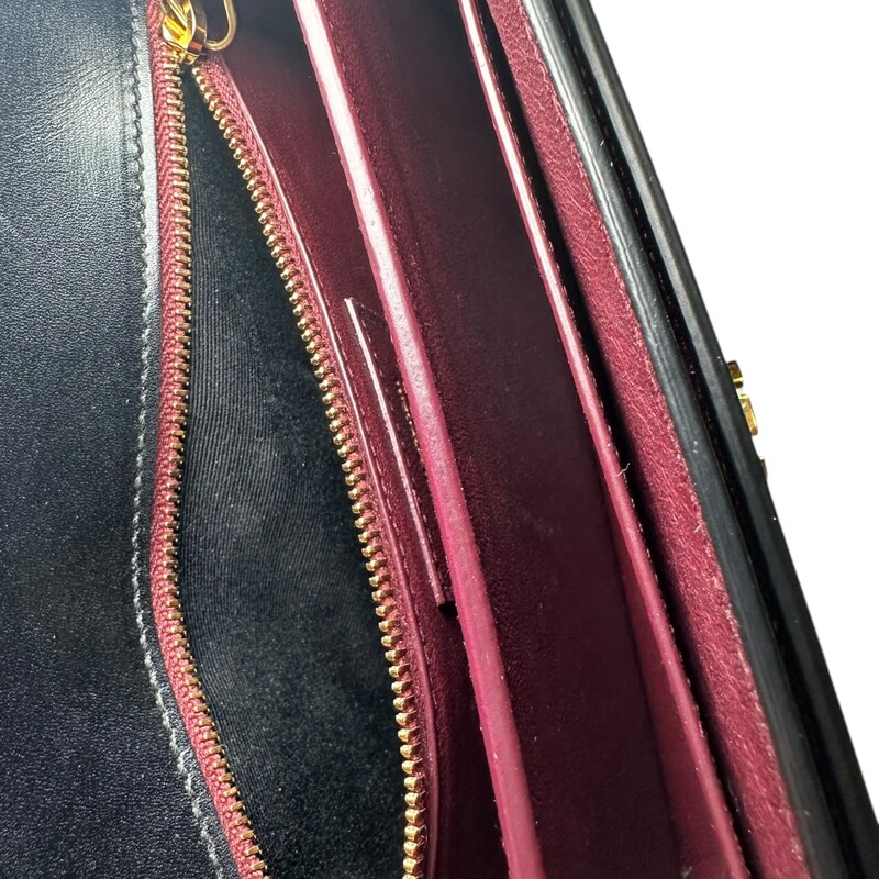 YSL Cassandra Smooth Calf Leather  Black Rivet Chain<br />
Bag<br />
<br />
Style Code: MAL 532750.1118<br />
<br />
Dimensions: 8L X 6 H inches<br />
<br />
In very good condition. Some scratching of the leather near the logo. Some scratching on hardware.<br />
<br />
Comes with original dust bag and box.