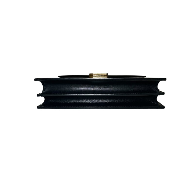 YSL Cassandra Smooth Calf Leather  Black Rivet Chain<br />
Bag<br />
<br />
Style Code: MAL 532750.1118<br />
<br />
Dimensions: 8L X 6 H inches<br />
<br />
In very good condition. Some scratching of the leather near the logo. Some scratching on hardware.<br />
<br />
Comes with original dust bag and box.
