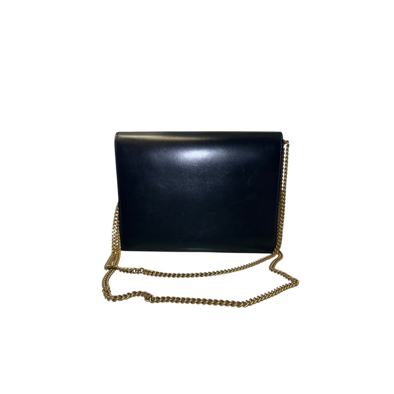 YSL Cassandra Smooth Calf Leather  Black Rivet Chain
Bag

Style Code: MAL 532750.1118

Dimensions: 8L X 6 H inches

In very good condition. Some scratching of the leather near the logo. Some scratching on hardware.

Comes with original dust bag and box.