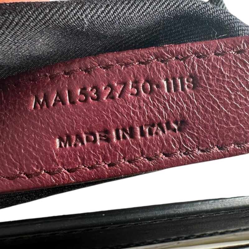 YSL Cassandra Smooth Calf Leather  Black Rivet Chain<br />
Bag<br />
<br />
Style Code: MAL 532750.1118<br />
<br />
Dimensions: 8L X 6 H inches<br />
<br />
In very good condition. Some scratching of the leather near the logo. Some scratching on hardware.<br />
<br />
Comes with original dust bag and box.