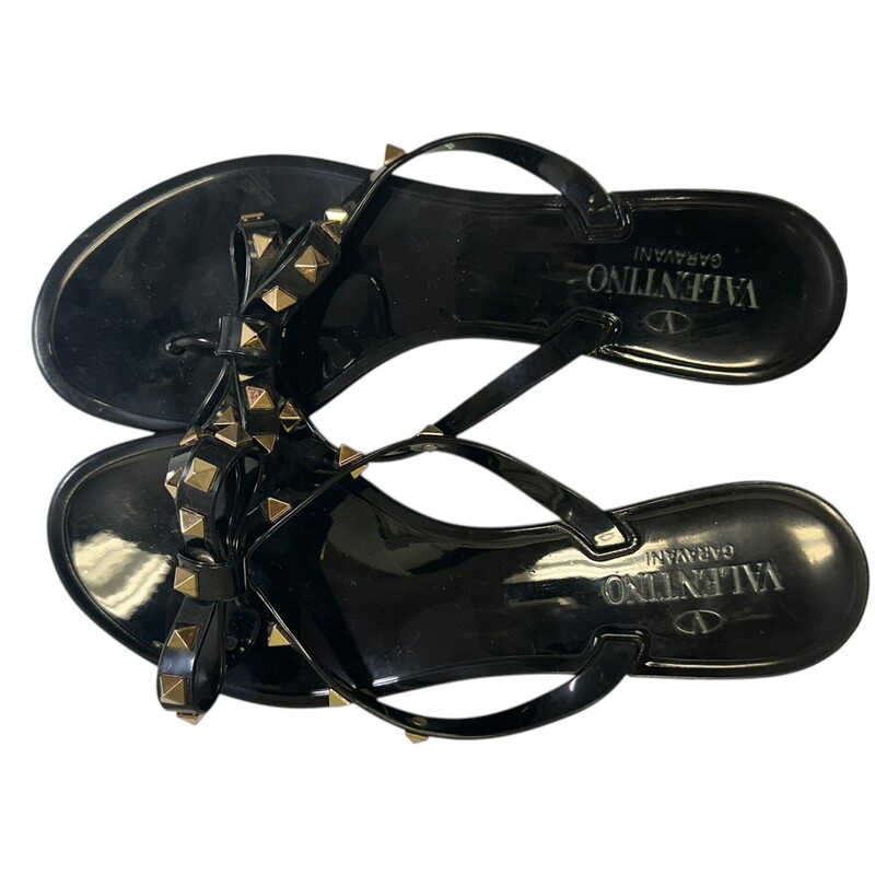 Valentino Rockstud Bow Black Sandals<br />
<br />
Size: 38<br />
<br />
Some minor scratches on hardware.<br />
<br />
Does not come with original dust bag or box.
