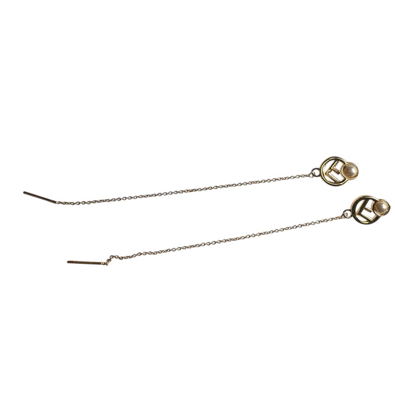 F Is Fendi Dangle Crystal Pearl Gold Tone Earrings

In very good condition. Very faint scratches on hardware.


Comes with the original dust bag and box.