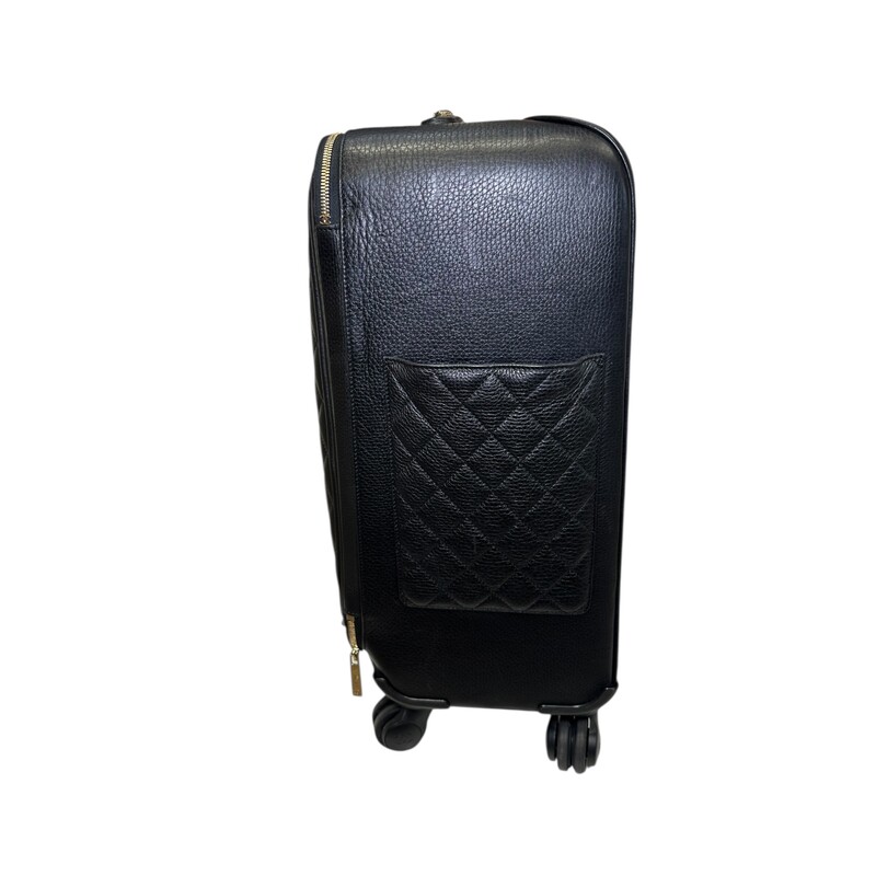Chanel Calfskin Leather Quilted Coco Cases Trolley<br />
<br />
Serial Code:23382294<br />
<br />
Dimensions:<br />
Handle Drop: 19 inches<br />
Heigth: 19 inches<br />
Width:14.25 inches<br />
Depth: 8.75 inches<br />
<br />
In very good condition. Some minor scratches on the leather.<br />
<br />
Does not come with original dust cover or box.
