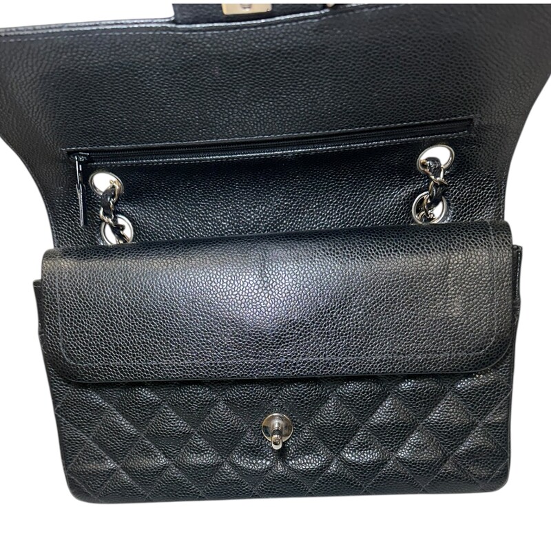 Chanel Caviar Double Flap Black Bag Silver Hardware<br />
<br />
Serial Code: 6322155<br />
<br />
Dimensions: 9.9 L  x  6 H x 2.3 W<br />
<br />
In very good condition. Some minor scratches on the hardware and some minor interior leather scratches.<br />
<br />
Comes with the original dust bag. No box.