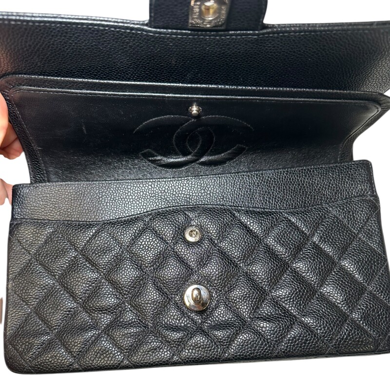 Chanel Caviar Double Flap Black Bag Silver Hardware<br />
<br />
Serial Code: 6322155<br />
<br />
Dimensions: 9.9 L  x  6 H x 2.3 W<br />
<br />
In very good condition. Some minor scratches on the hardware and some minor interior leather scratches.<br />
<br />
Comes with the original dust bag. No box.