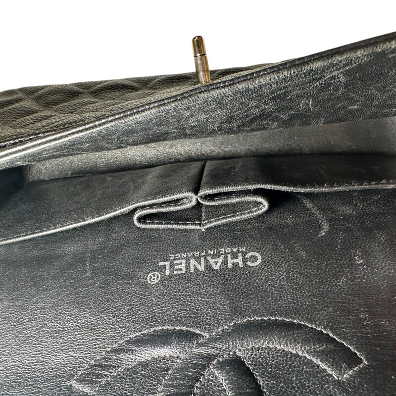 Chanel Caviar Double Flap Black Bag Silver Hardware<br />
<br />
Serial Code: 6322155<br />
<br />
Dimensions: 9.9 L  x  6 H x 2.3 W<br />
<br />
In very good condition. Some minor scratches on the hardware and some minor interior leather scratches.<br />
<br />
Comes with the original dust bag. No box.