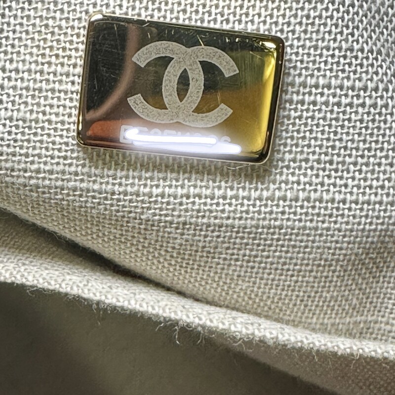 Chanel Deauville Mixed Canvas Small Tote<br />
<br />
Date Code: EE******<br />
<br />
Dimensions:<br />
Base length: 12.75 in<br />
Height: 9.75 in<br />
Width: 6.00 in<br />
Drop: 3.75 in<br />
Drop: 12.00 in<br />
<br />
In excellent condition. Light scuffing under the handels.<br />
<br />
Comes with the original dust bag.