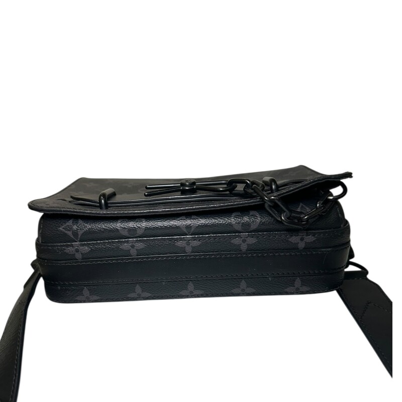 Louis Vuitton Streamer Eclipse Crossbody<br />
<br />
Date Code: Chipped/Entrupy Certificate Provided<br />
<br />
Dimensions:<br />
Base length: 9.25 in<br />
Height: 7 in<br />
Width: 3 in<br />
Drop: 21 in<br />
<br />
In very good condition. Light scratching to the hardware. Light wear to the interior.<br />
<br />
Does not come with the original dust bag or box.