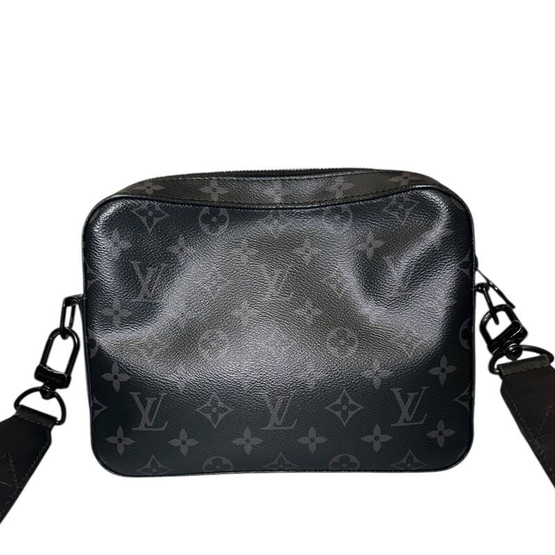 Louis Vuitton Streamer Eclipse Crossbody

Date Code: Chipped/Entrupy Certificate Provided

Dimensions:
Base length: 9.25 in
Height: 7 in
Width: 3 in
Drop: 21 in

In very good condition. Light scratching to the hardware. Light wear to the interior.

Does not come with the original dust bag or box.