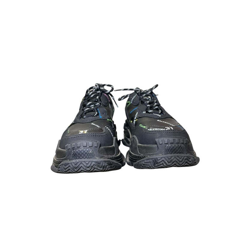 Balenciaga Triple S All Over Logo Sneakers<br />
<br />
Size: 37<br />
<br />
In very good condition. Some minor scuffs on the rubber soles.<br />
<br />
Does not come with original dust bag or box.