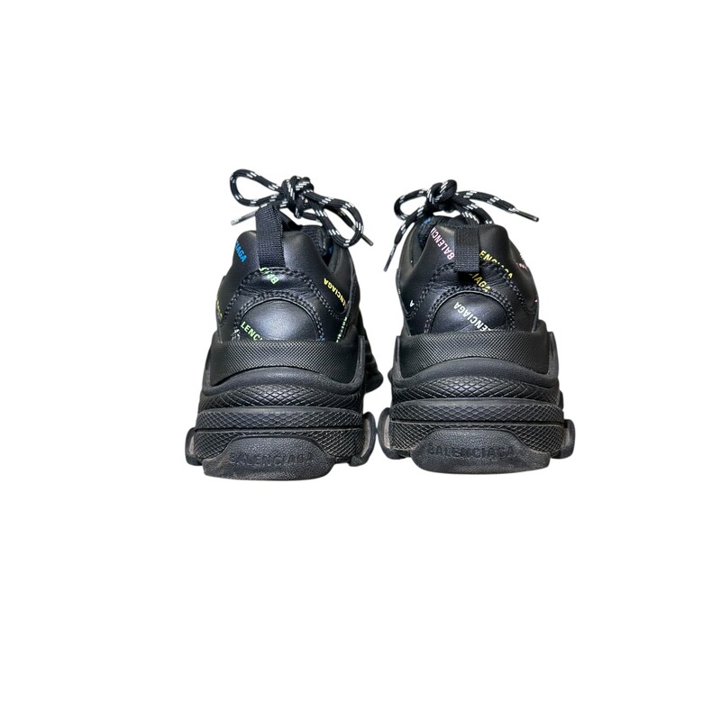 Balenciaga Triple S All Over Logo Sneakers<br />
<br />
Size: 37<br />
<br />
In very good condition. Some minor scuffs on the rubber soles.<br />
<br />
Does not come with original dust bag or box.