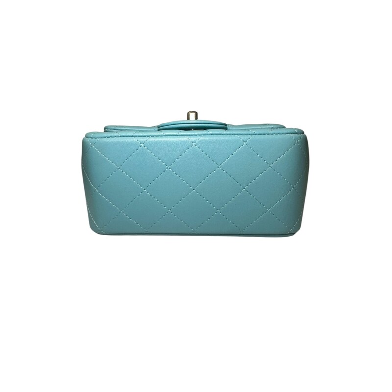 Chanel Quilted Square Mini Light Blue<br />
<br />
Date Code: UC******<br />
<br />
Dimensions:<br />
Base length: 6.25 in<br />
Height: 5 in<br />
Width: 3 in<br />
Drop: 19.75 in<br />
<br />
In excellent condition.<br />
<br />
Comes with the original dust bag and box.