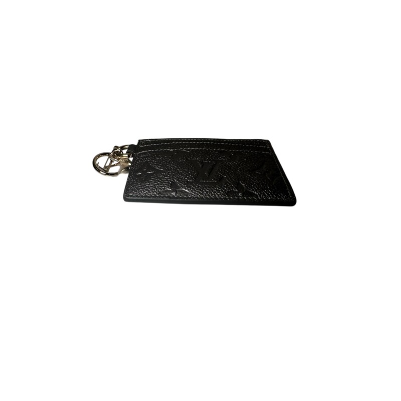 Louis Vuitton Charms Card Holder Monogram<br />
Empreinte in Silver<br />
<br />
Date Code: Microchip<br />
<br />
Dimensions: 4 x 2.9 x 0.1 inches<br />
                        (Length x Height x Width)<br />
<br />
In excellent condition. Like New.<br />
<br />
Comes with original dust bag and box.