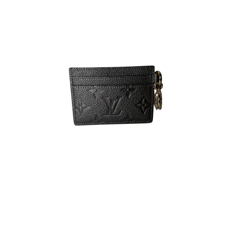 Louis Vuitton Charms Card Holder Monogram<br />
Empreinte in Silver<br />
<br />
Date Code: Microchip<br />
<br />
Dimensions: 4 x 2.9 x 0.1 inches<br />
                        (Length x Height x Width)<br />
<br />
In excellent condition. Like New.<br />
<br />
Comes with original dust bag and box.