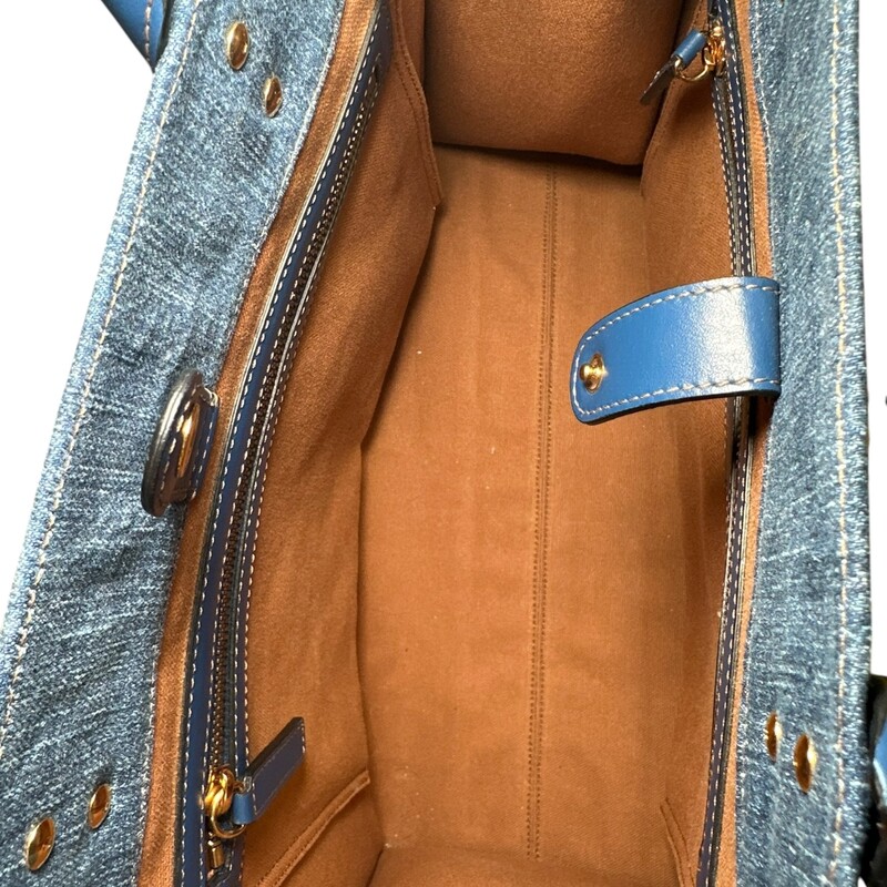 Versace La Medusa Denim Tote<br />
<br />
Dimensions: 15 L X 12 H inches<br />
<br />
In good condition. Minor stain on the front of the bag and minor corner wear.<br />
<br />
Does not come with original dust bag or box.