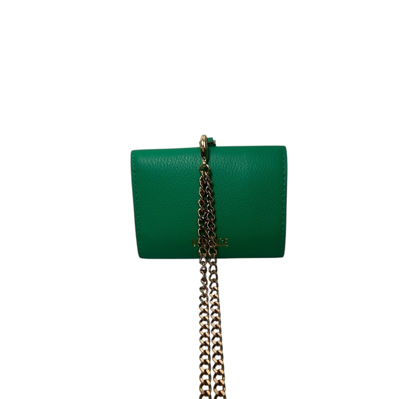Versace Medusa Wallet on a Chain

Dimensions:3.75 L x 2.7 H inches

In excellent condition. Like new.

Does not come with original dust bag or box.