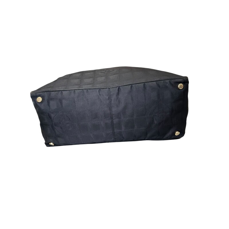 Chanel Nylon Travel Logo Tote<br />
<br />
Serial Code:8617740<br />
<br />
Dimensions: 10 L X 11 H inches<br />
<br />
In very good condition. Some corner wear.<br />
<br />
Does not come with original dust bag or box.