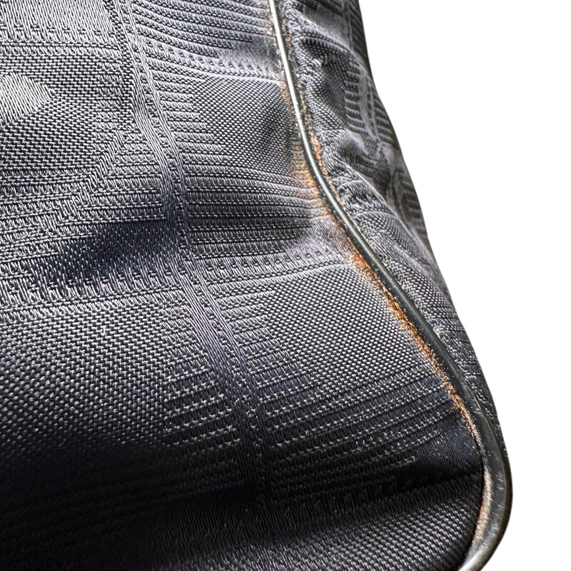 Chanel Nylon Travel Logo Tote<br />
<br />
Serial Code:8617740<br />
<br />
Dimensions: 10 L X 11 H inches<br />
<br />
In very good condition. Some corner wear.<br />
<br />
Does not come with original dust bag or box.