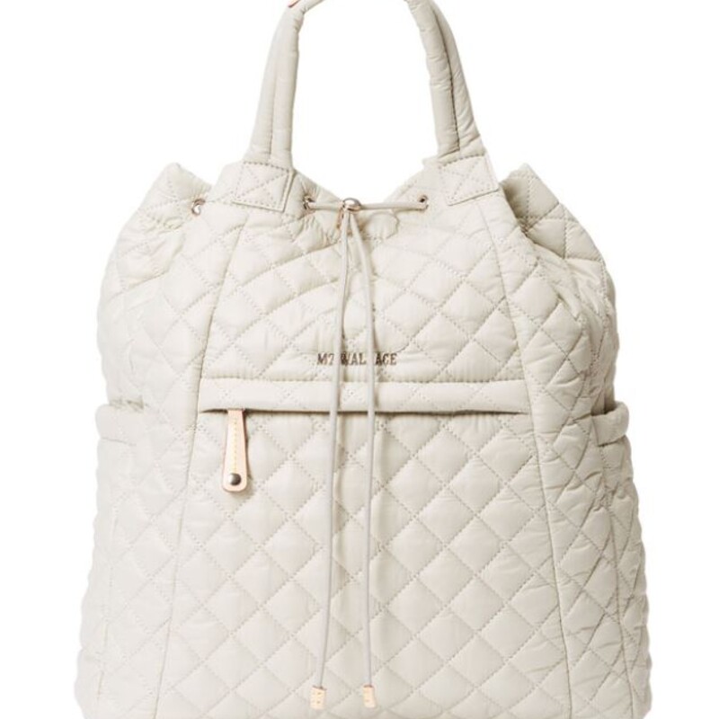 MZ Wallace Metro Convertible Backpack
Gray Gold Size: 14 x 11H
Retails: $275
As Is - some ink marks inside