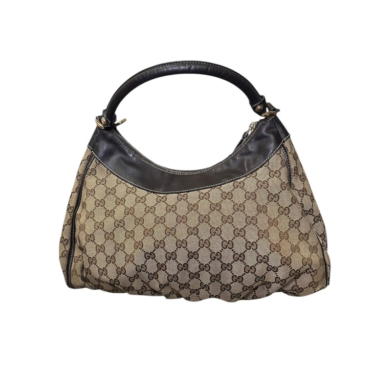 Gucci D Ring Large Monogram Tote<br />
<br />
Style Code: 189833 502752<br />
<br />
Dimensions:<br />
<br />
In good condition. Wear to the handle, leather trim and canvas.<br />
<br />
Does not come with the original dust bag or box.