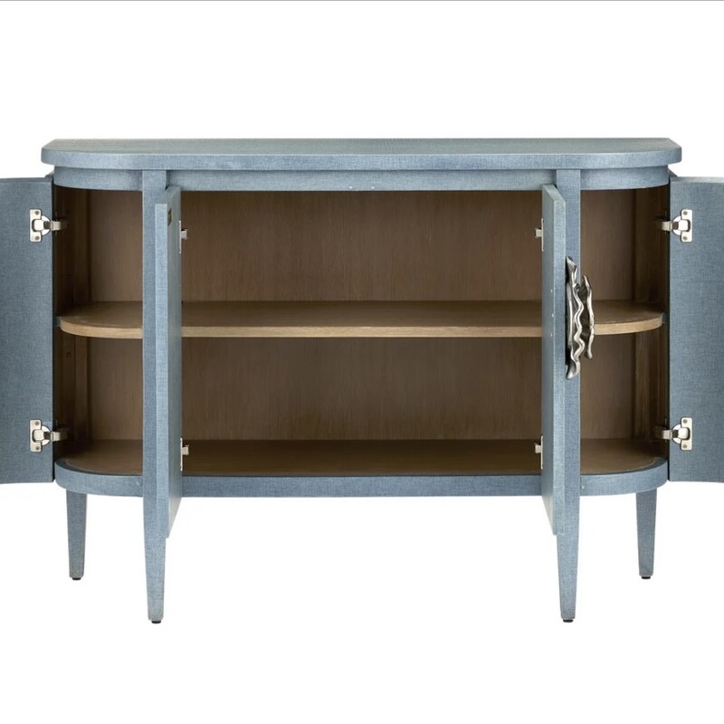 Currey & Co Briallen Demilune Cabinet
Blue Gold Size: 48 x 17 x 34.5H
Laquered blue linen/polished nickel
White oak solds & veneer/brass
Retails: $4740